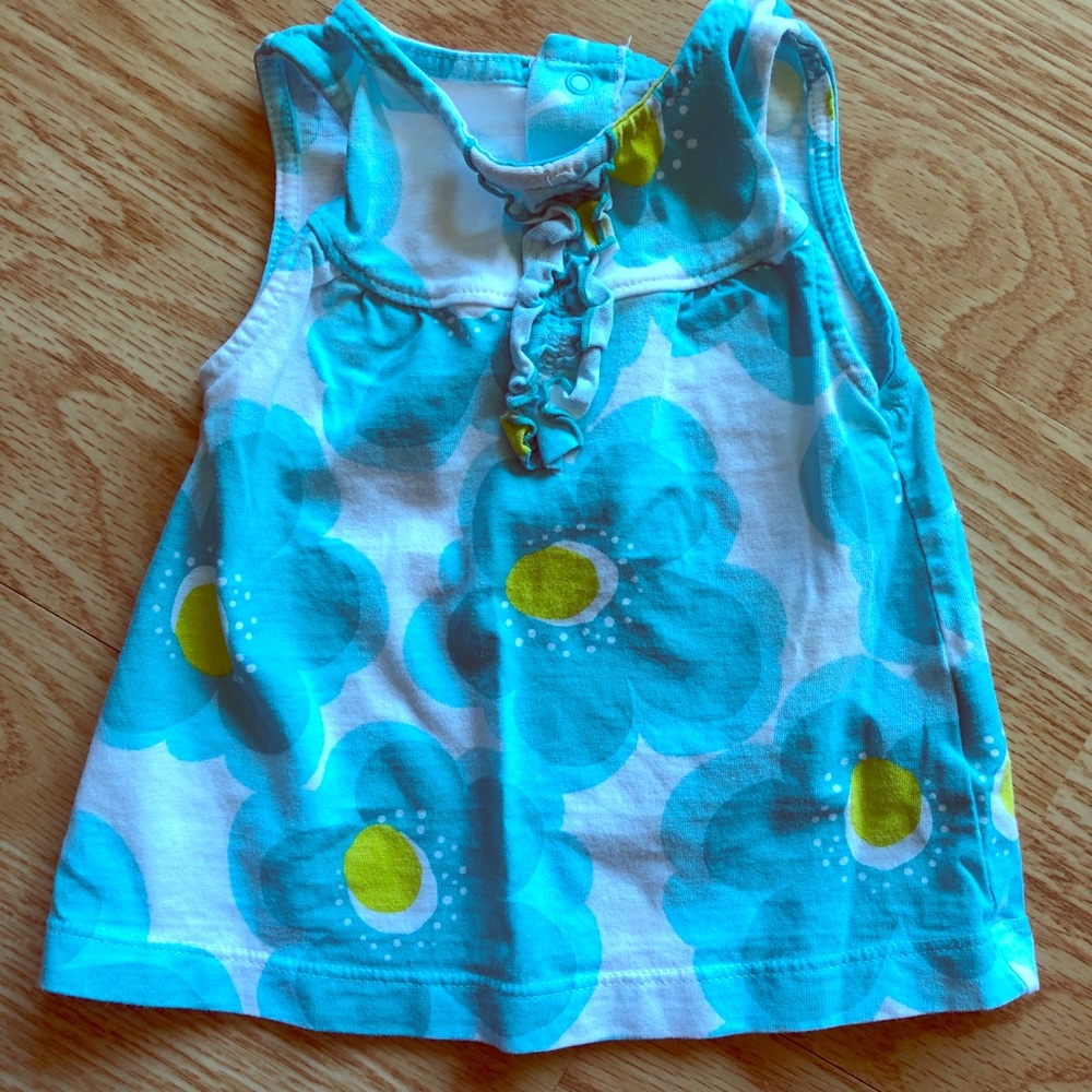 ( cute with fish shorts even though size differs)